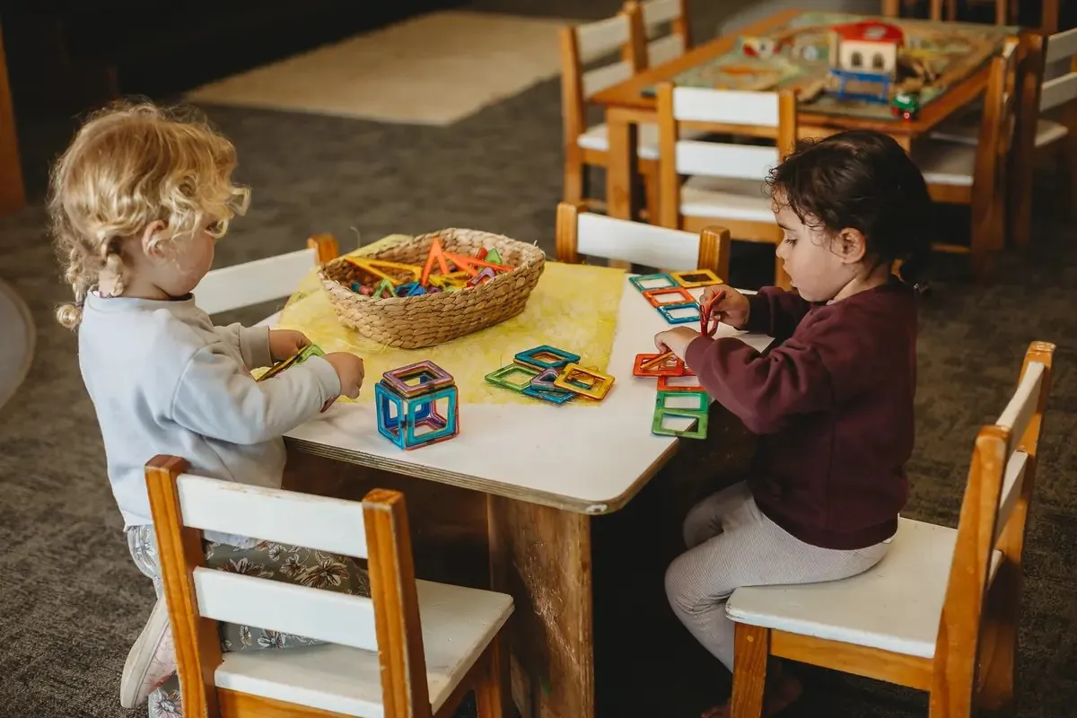 Children sharing a meal at Canopy